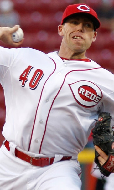 Reds' Axelrod leaves after 7 pitches vs Cardinals
